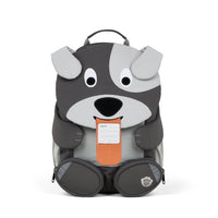 The Affenzahn Large Friend Dog backpack has a unique tongue feature that can be pulled out to display a name tag or photo.