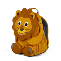Right side view highlighting the Affenzahn Large Friend Lion backpack`s depth, adjustable shoulder straps, and the Lion's ear detailing.