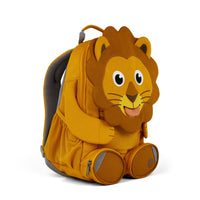 Left side view highlighting the Affenzahn Large Friend Lion backpack`s depth, adjustable shoulder straps, and the Lion's ear detailing.