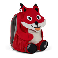 Left side view highlighting the Affenzahn Large Friend Fox backpack`s depth, adjustable shoulder straps, and the Fox's ear detailing.