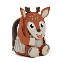 Left side view highlighting the Affenzahn Large Friend Deer backpack`s depth, adjustable shoulder straps, and the Deer's ear detailing.