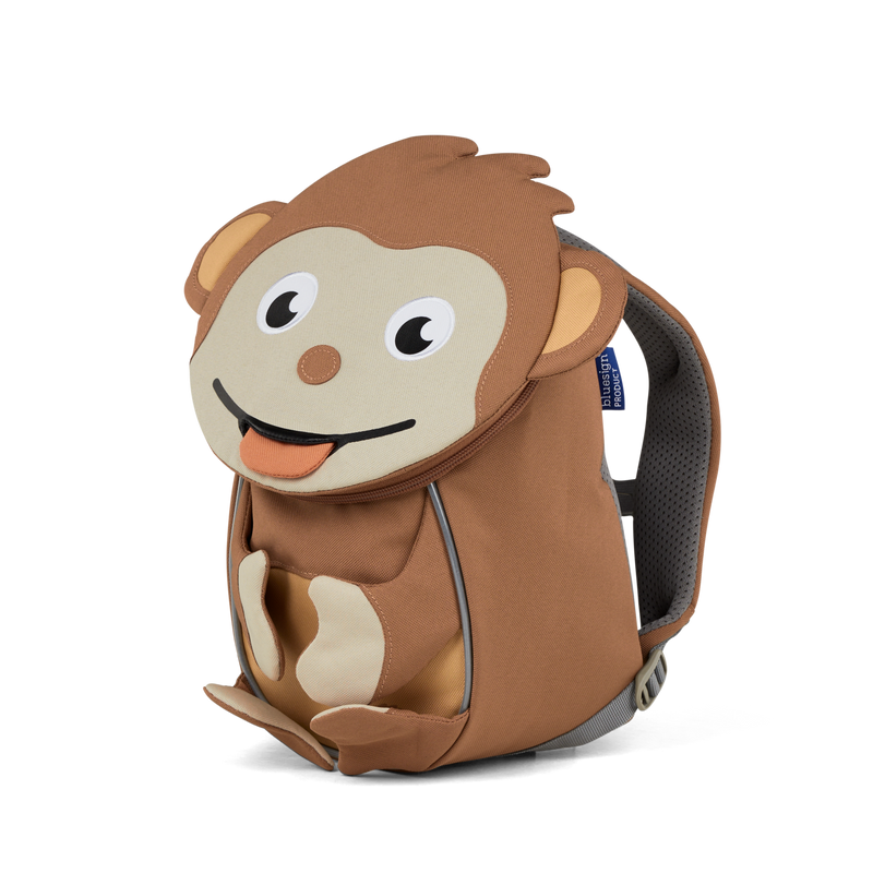 Right side view highlighting the Affenzahn Small Friend Monkey backpack`s depth, adjustable shoulder straps, and the Monkey's ear detailing.