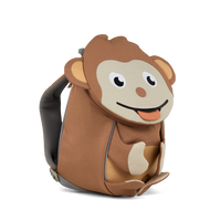 Left side view highlighting the Affenzahn Small Friend Monkey backpack`s depth, adjustable shoulder straps, and the Monkey's ear detailing.