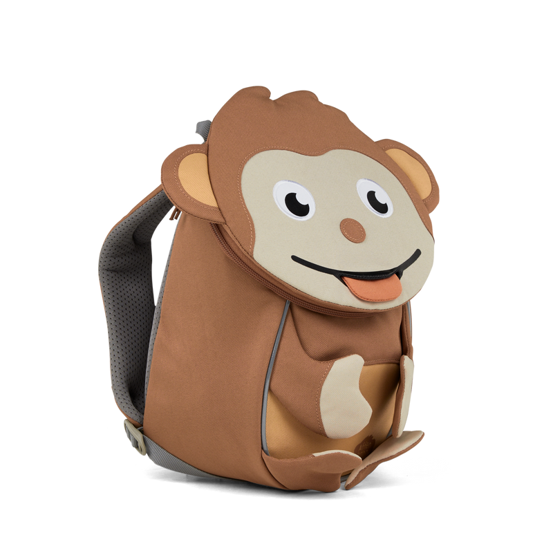 Left side view highlighting the Affenzahn Small Friend Monkey backpack`s depth, adjustable shoulder straps, and the Monkey's ear detailing.