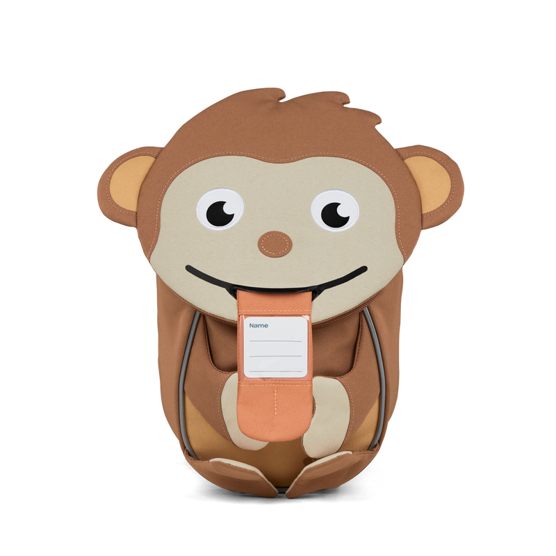The Affenzahn Small Friend Monkey backpack has a unique tongue feature that can be pulled out to display a name tag or photo.