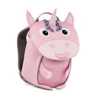 Left side view highlighting the Affenzahn Small Friend Unicorn backpack`s depth, adjustable shoulder straps, and the Unicorn's ear detailing.