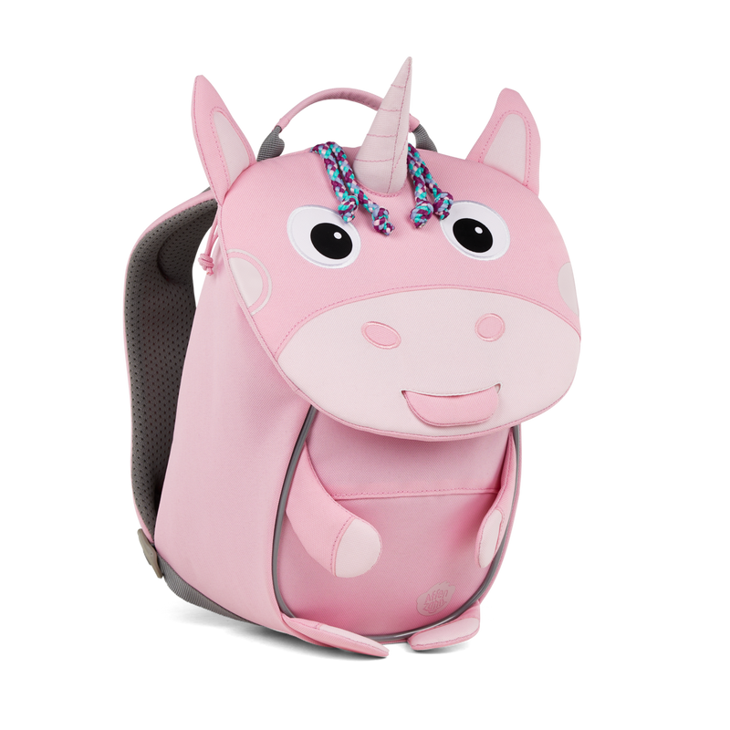 Left side view highlighting the Affenzahn Small Friend Unicorn backpack`s depth, adjustable shoulder straps, and the Unicorn's ear detailing.