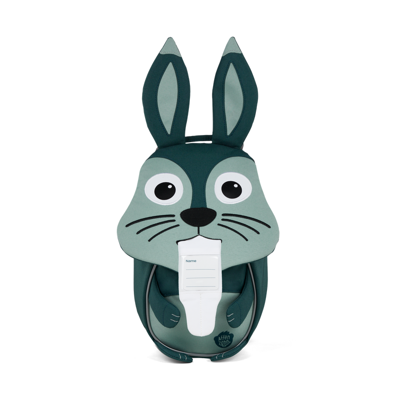 The Affenzahn Small Friend Rabbit backpack has a unique tongue feature that can be pulled out to display a name tag or photo.