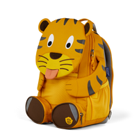 Right side view highlighting the Affenzahn Large Friend Tiger backpack`s depth, adjustable shoulder straps, and the Tiger's ear detailing.