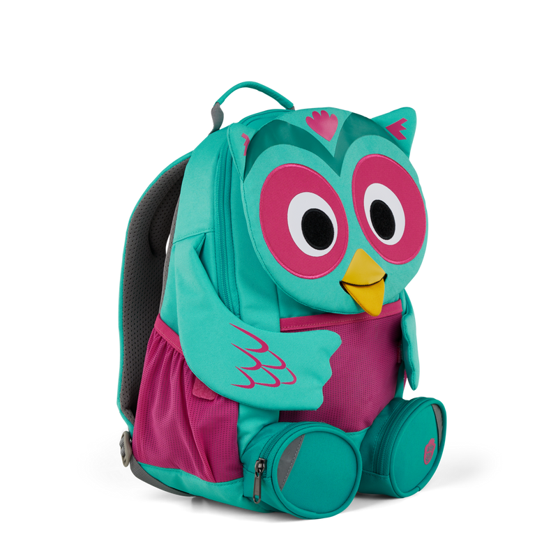Left side view highlighting the Affenzahn Large Friend Owl backpack`s depth, adjustable shoulder straps, and the Owl's ear detailing.