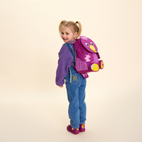 Affenzahn Large Friend Bird backpack worn by a child, illustrating its size and fit.