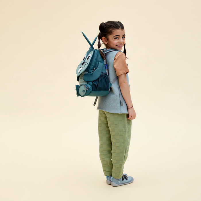 Affenzahn Large Friend Rabbit backpack worn by a child, illustrating its size and fit.