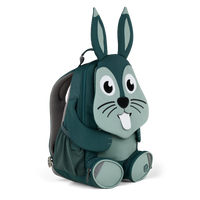 Left side view highlighting the Affenzahn Large Friend Rabbit backpack`s depth, adjustable shoulder straps, and the Rabbit's ear detailing.
