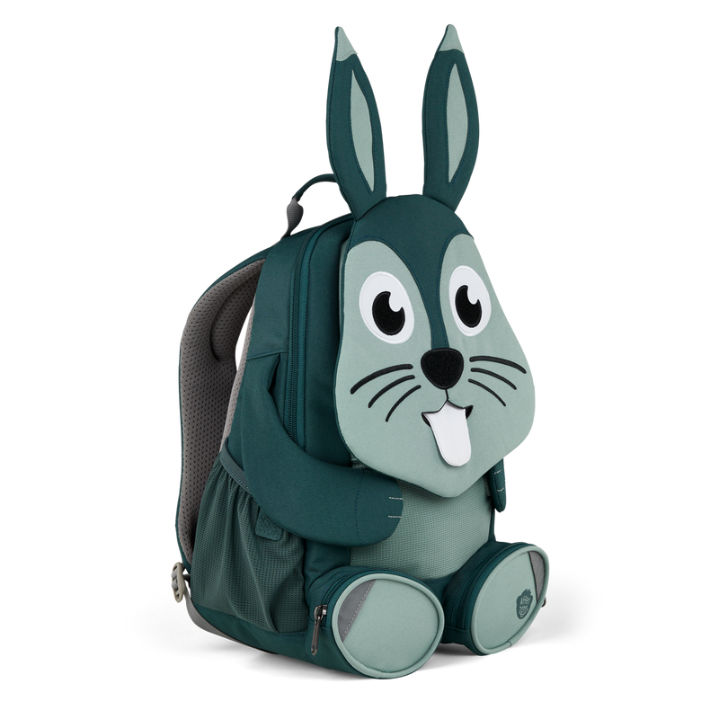 Left side view highlighting the Affenzahn Large Friend Rabbit backpack`s depth, adjustable shoulder straps, and the Rabbit's ear detailing.