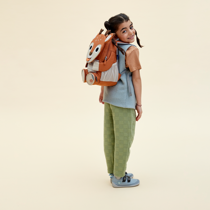 Affenzahn Large Friend Deer backpack worn by a child, illustrating its size and fit.