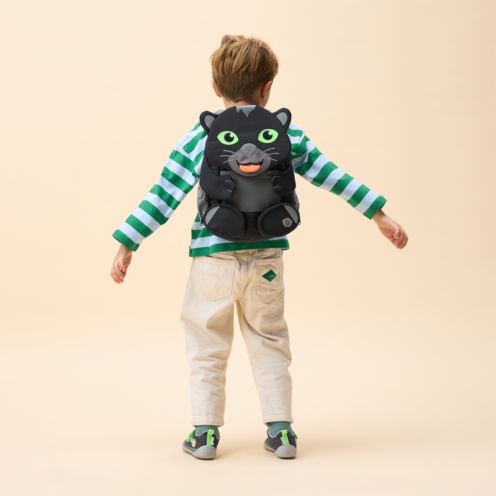 Affenzahn Large Friend Panther backpack worn by a child, illustrating its size and fit.