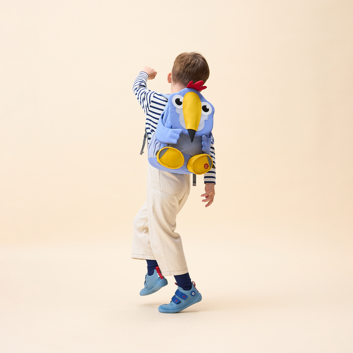 Affenzahn Large Friend Toucan backpack worn by a child, illustrating its size and fit.