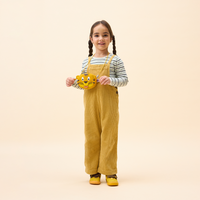 A child wearing the Affenzahn Tiger Kids Wallet around the neck, demonstrating the adjustable strap length.