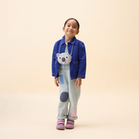 A child wearing the Affenzahn Koala Kids Wallet around the neck, demonstrating the adjustable strap length.